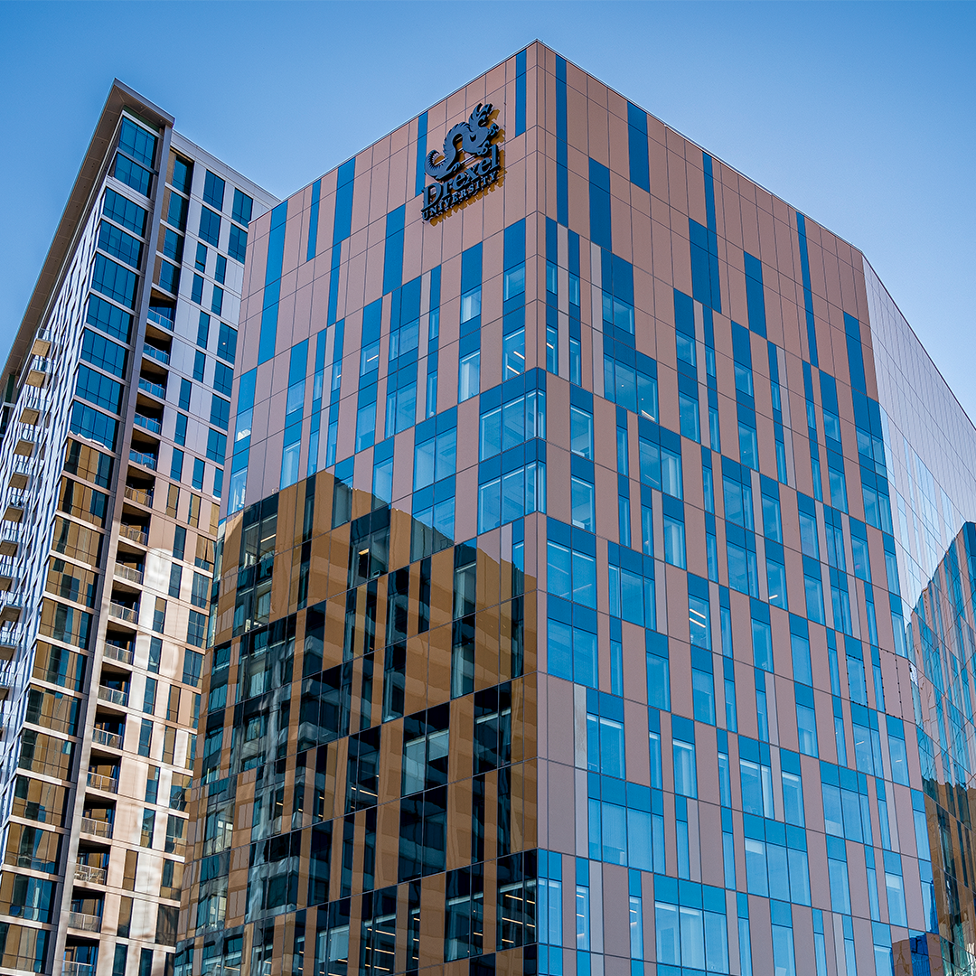 Exterior image of Health Sciences Building, 11 story building with orange facade and windows